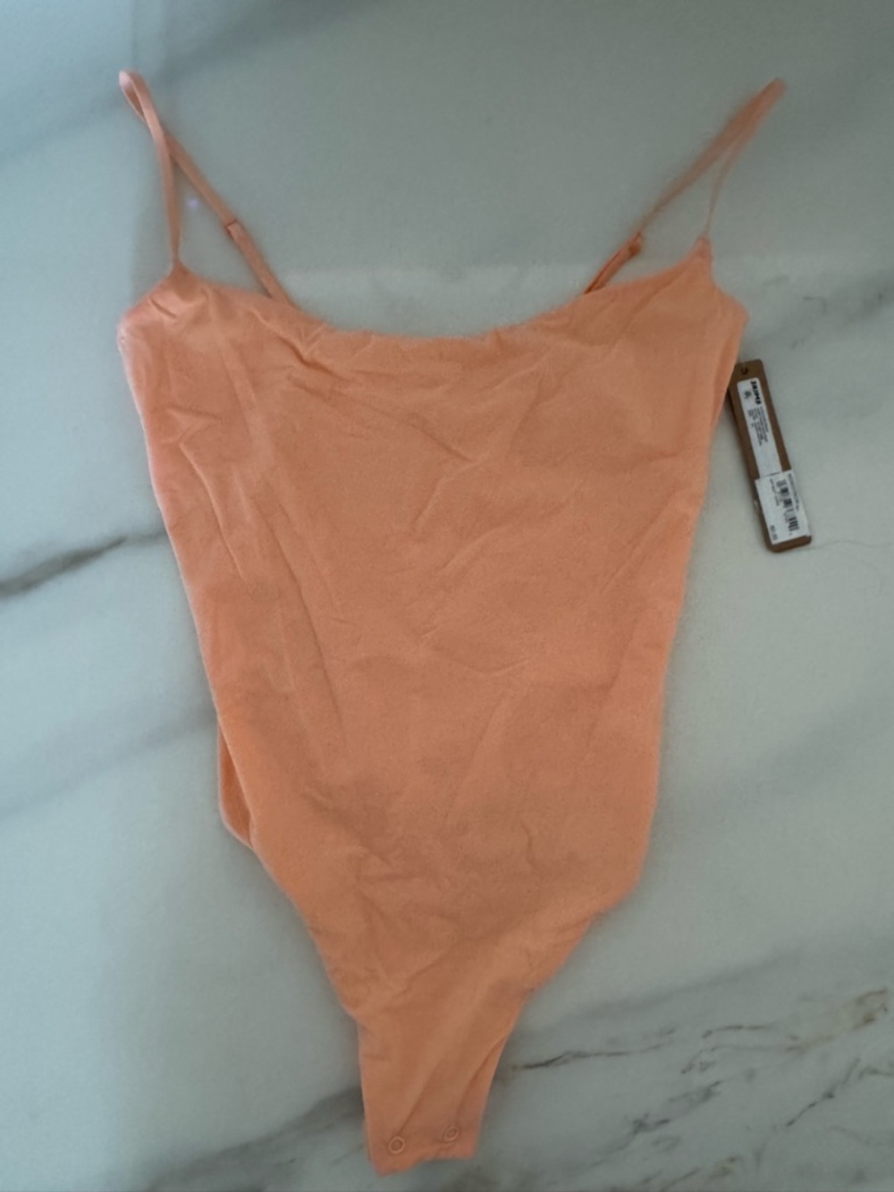 SKIMS Peach Spaghetti Strap Bodysuit